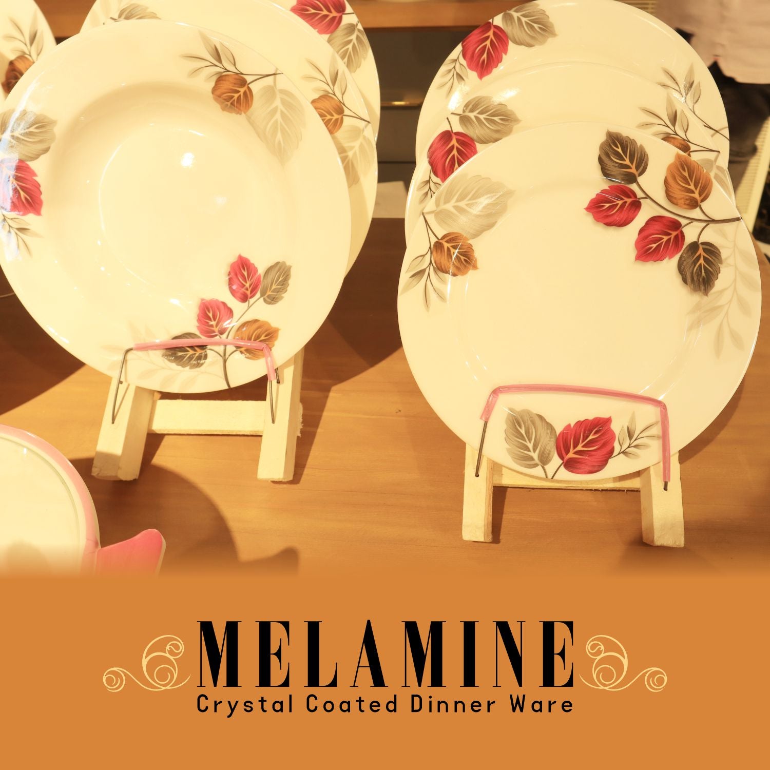 Two melamine dinner plates with floral design on stands, brand 'Melamine' visible.