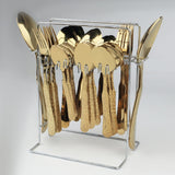 Gold cutlery set in a clear stand on a light gray background at affordable price from best cookware brand in Pakistna
