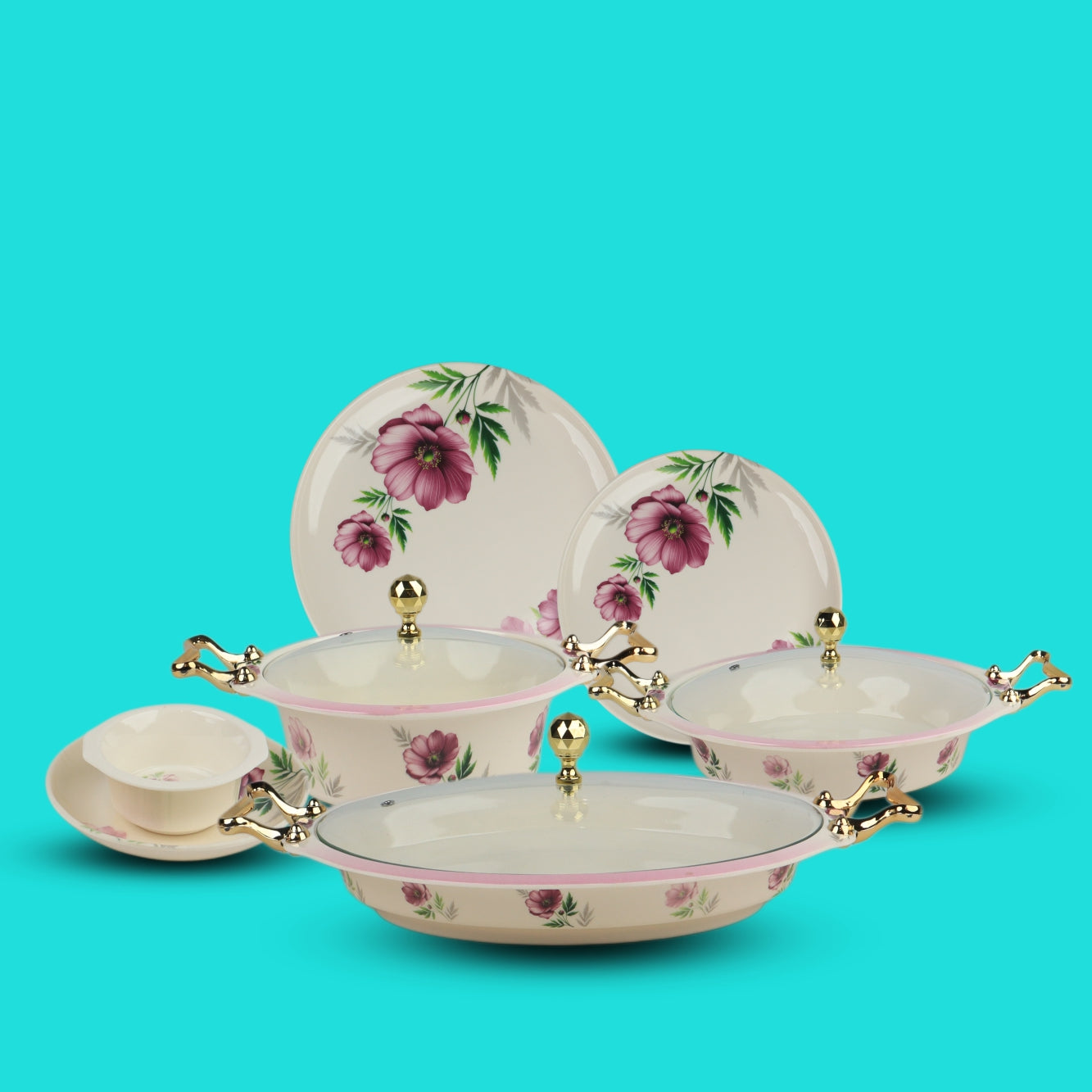 Set of ceramic dishes with floral designs on a turquoise background