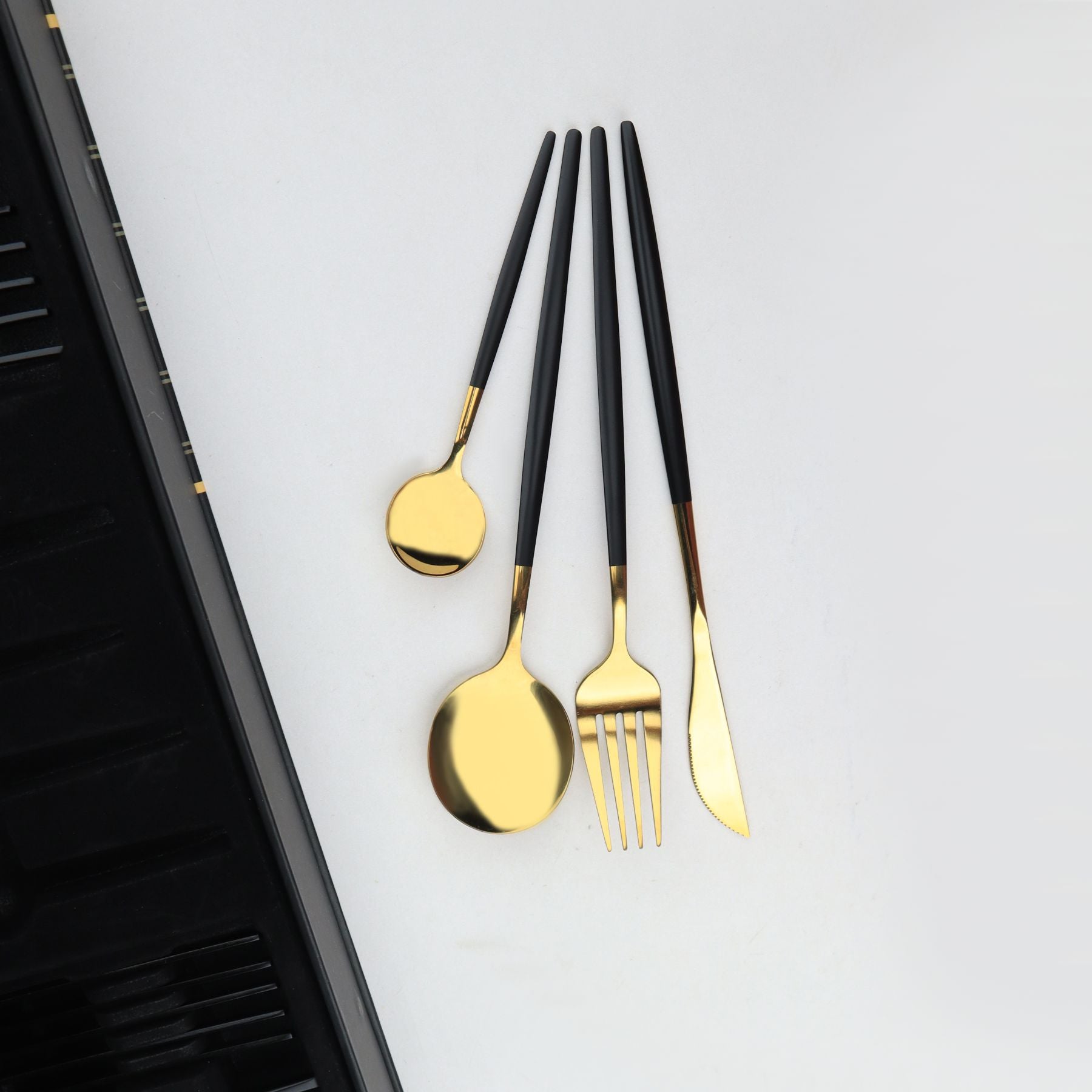 black and pvd coated gold plating imported cutlery set 6 persons serving 24 pcs best for gifting and dinning at majesticchef.pk with low prices