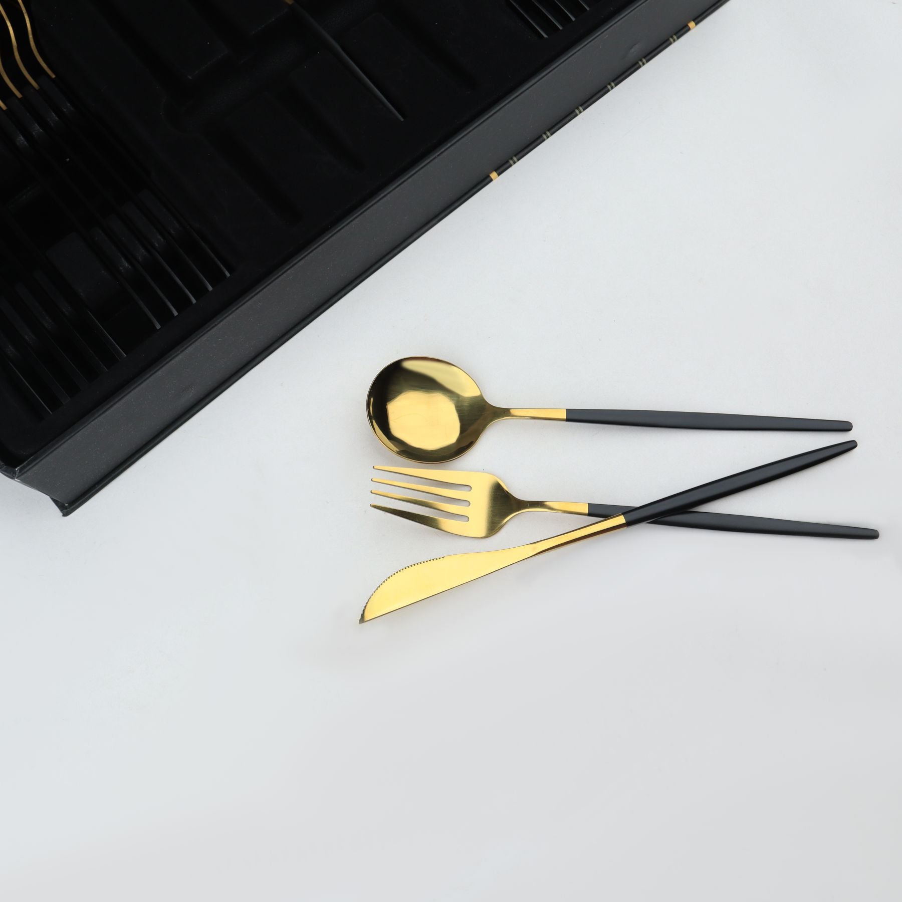 black and pvd coated gold plating imported cutlery set 6 persons serving 24 pcs best for gifting and dinning at majesticchef.pk with low prices