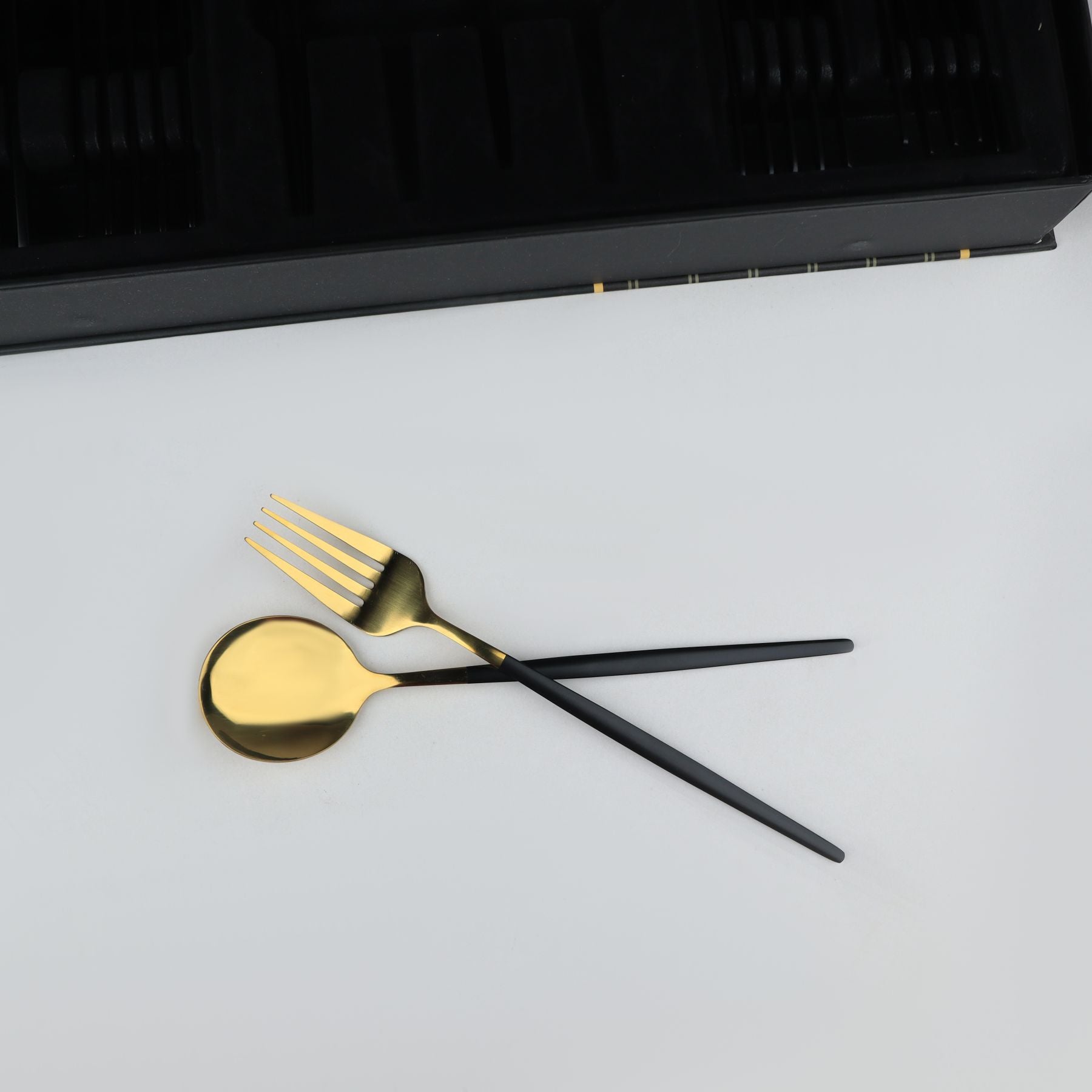 black and pvd coated gold plating imported cutlery set 6 persons serving 24 pcs best for gifting and dinning at majesticchef.pk with low prices