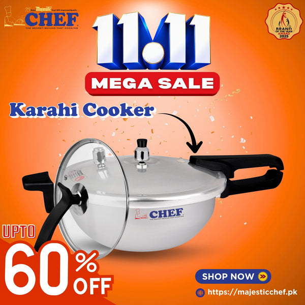 Silver karahi pressure cooker with black handles, locking lid, and a separate glass lid