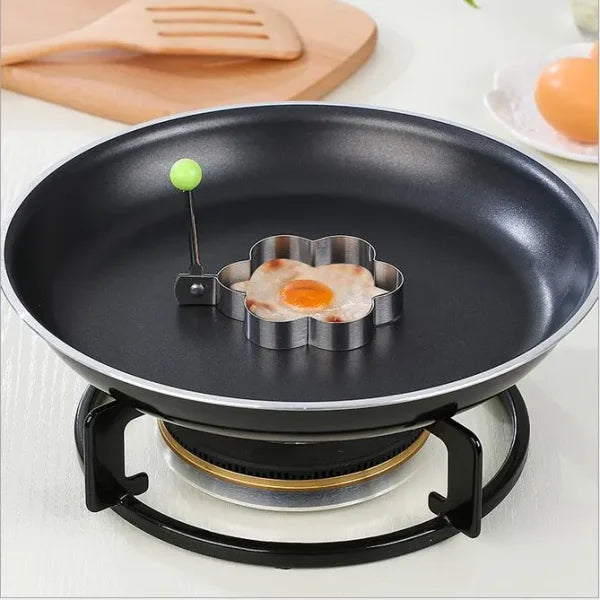 https://majesticchef.pk/cdn/shop/files/EggShaperKitchenToolsStar_Heart_Round_FlowerShapedStainlessSteel_PackOf4-6.webp?v=1692360025