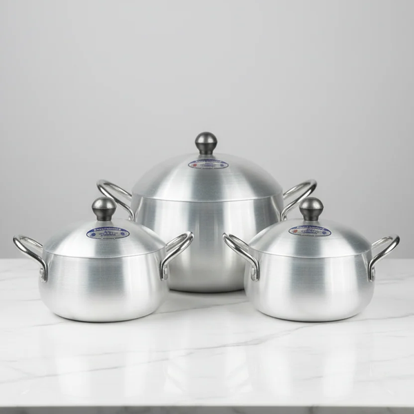 Stainless steel cooking pot set with three domed lids and side handles